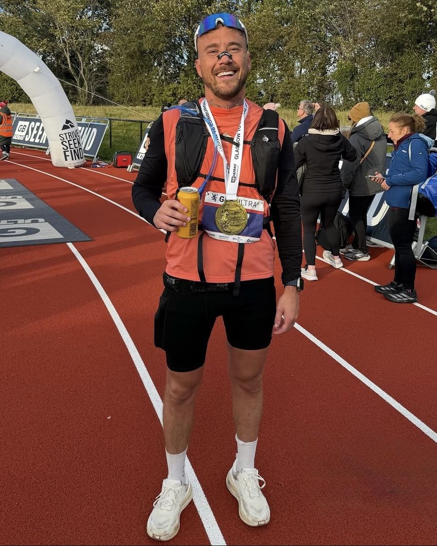 Declan at the ultra finish line with his medal